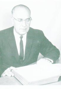 Dr. Clarence E. Cowen